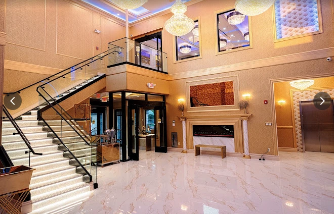 Pearl’s grand lobby with illuminated staircase, crystal chandeliers and marble floors
